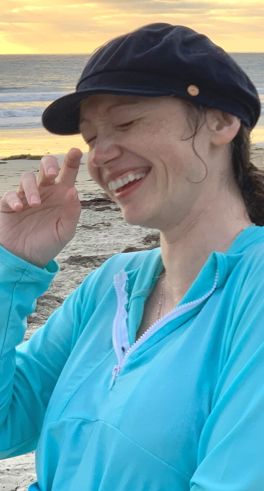 An image of Jen Gadus laughing like a nerd.